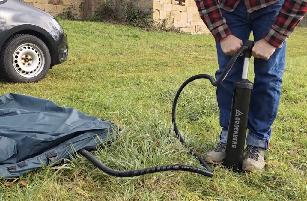 Air platform being inflated to 10 PSI with the hand pump